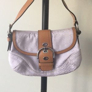 Pale lavender Coach purse. Like new, not used.